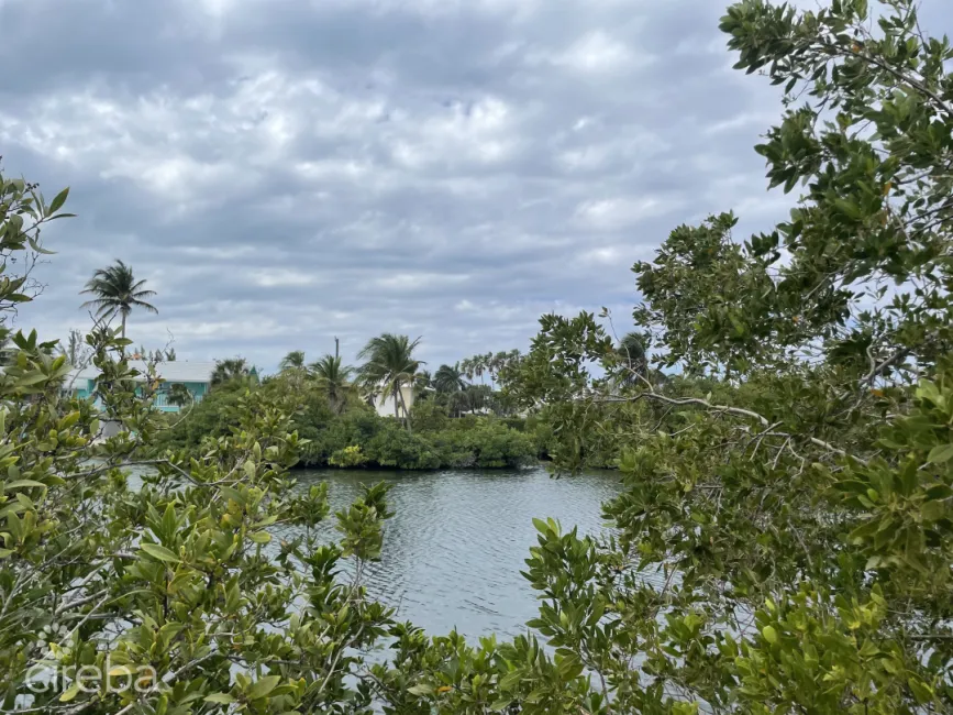 CAYMAN KAI CANAL FRONT LOT W/ APPROVED PLANS - WATER CAY ROAD