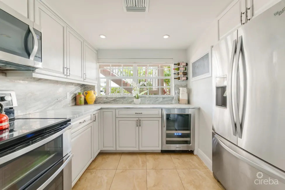 BRITANNIA LIONS COURT UNIT #213 - 1-BEDROOM GARDEN VIEW CONDO