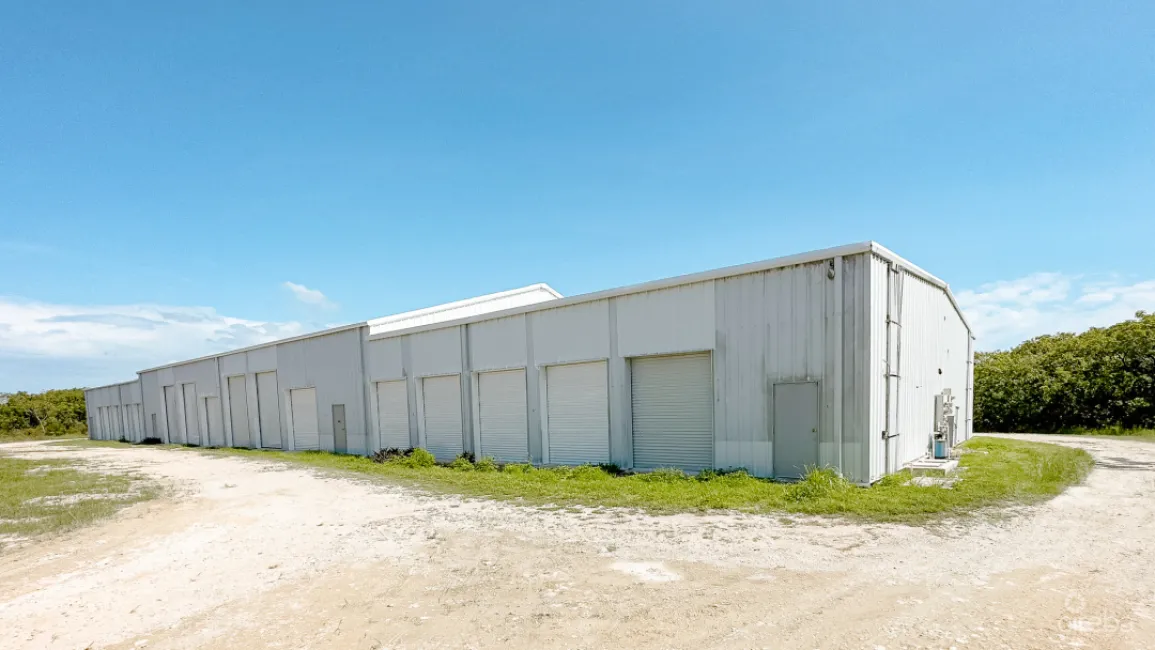 LITTLE CAYMAN WAREHOUSE (20 UNITS) AND LAND SUB-DIVISION 13 LOTS
