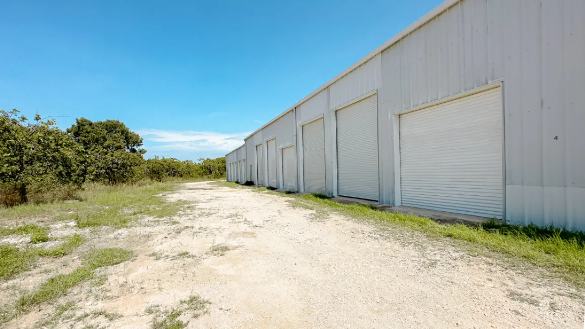 LITTLE CAYMAN WAREHOUSE (20 UNITS) AND LAND SUB-DIVISION 13 LOTS