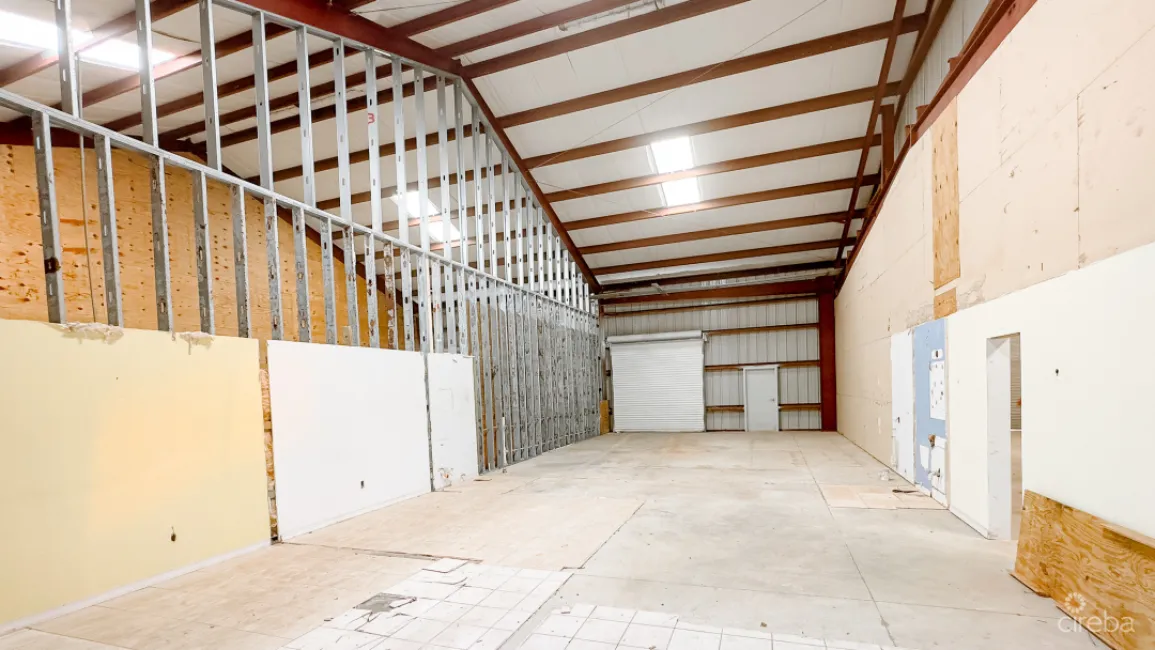 LITTLE CAYMAN WAREHOUSE (20 UNITS) AND LAND SUB-DIVISION 13 LOTS