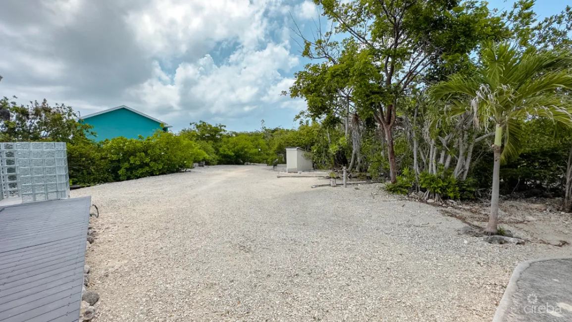 LITTLE CAYMAN OCEAN VIEW RESIDENTIAL HOME WITH BEACHFRONT LOT
